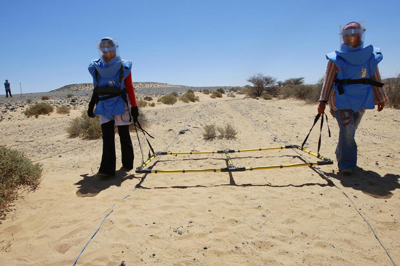 women deminers at work